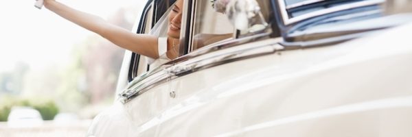 beautiful-bride-sits-with-wedding-bouquet-retro-car-has-fun_8353-7233